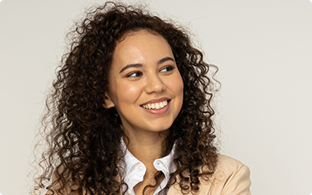 Smiling woman with curly hair